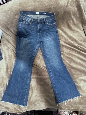 Nicole Miller Medium Blue High-Rise Flare Jeans with Raw Hem